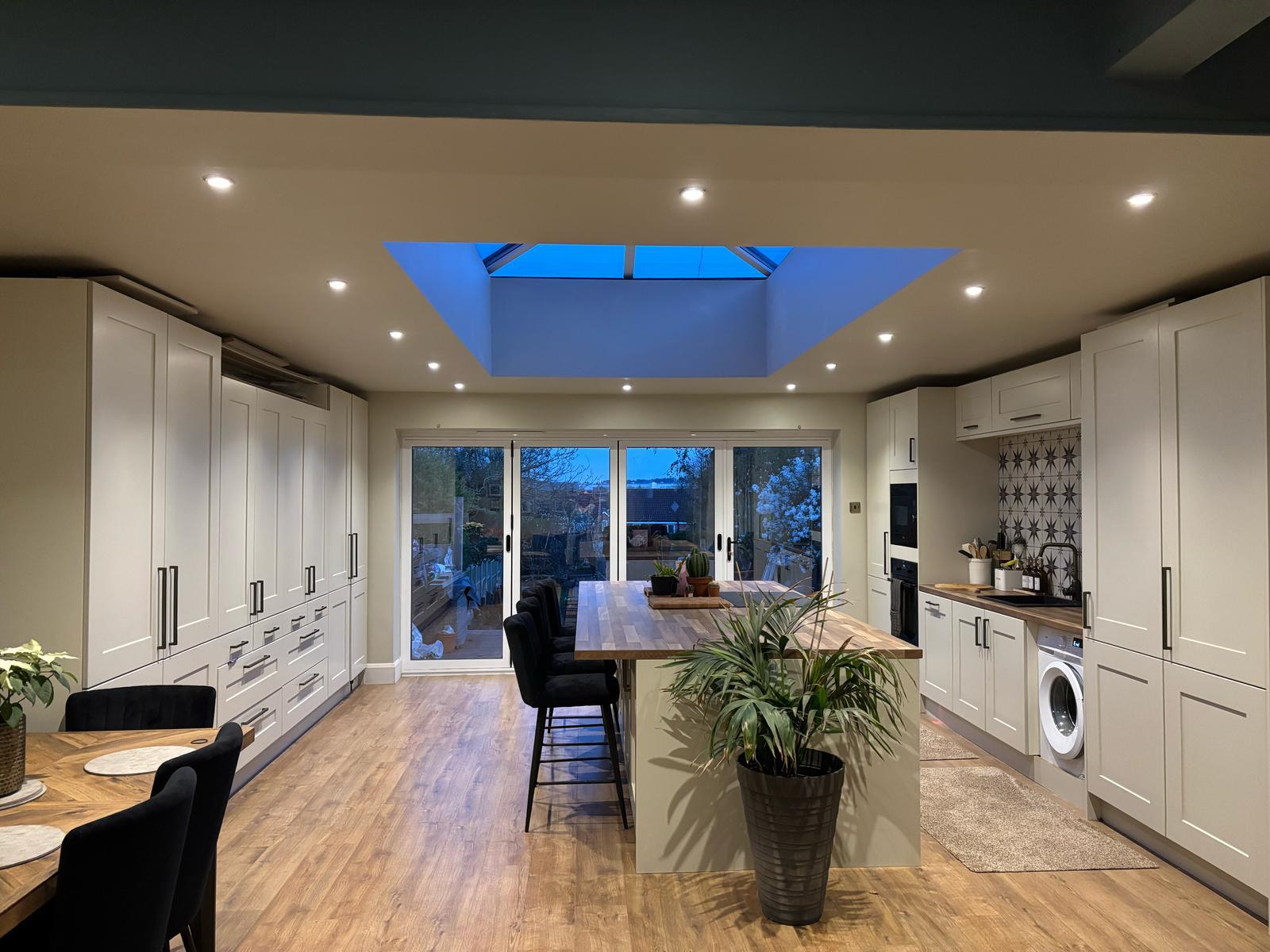 Bright open plan kitchen extension with garden view