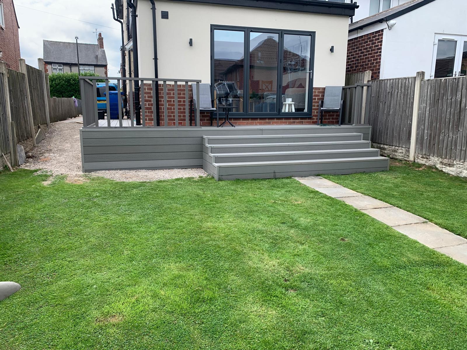 Composite decking and landscaped garden by Procraft